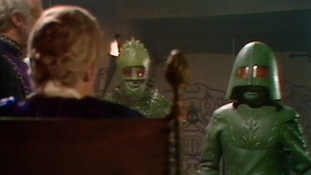 The more familiar Ice Warriors are usually accompanied in the classic era by their more slimline officer class - the Ice Lords (c) BBC Studios Doctor Who Curse of Peladon Alan Bennion