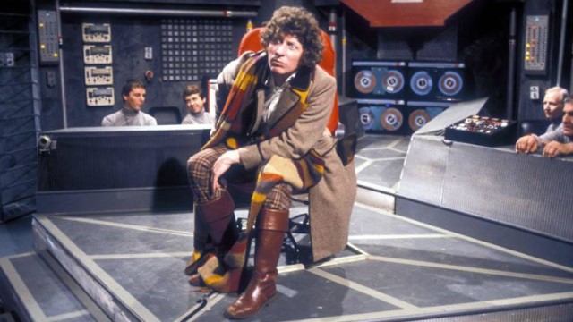 Brown leather cuff boots where the Doctor's main default footwear in Seasons Sixteen and Seventeen, seen here with the tweed coat and tartan trousers (c) BBC Studios Doctor Who Tom Baker